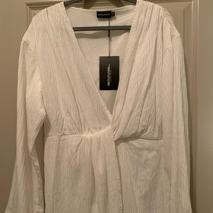 Deep V, lined pleated dress